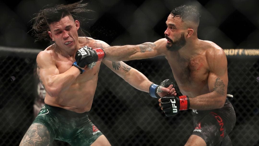 Rob Font, right, in action against Ricky Simon during their mixed martial arts bout at UFC Fight Night.