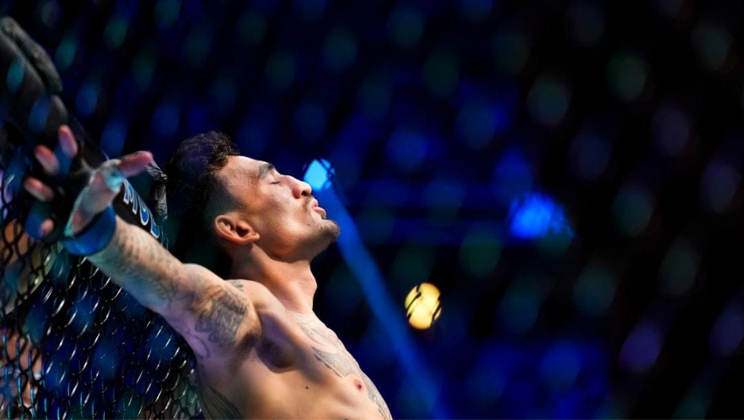 Max Holloway prepares to fight Alexander Volkanovski in a featherweight title bout during the UFC 276 mixed martial arts event.