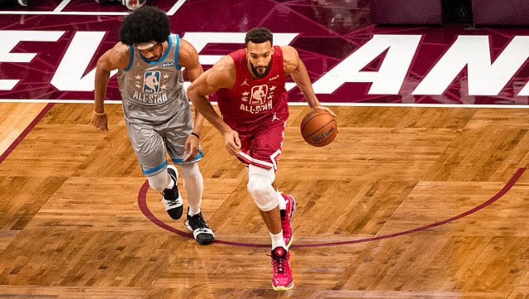 Rudy Gobert of the Utah dribbles past Jarrett Allen of the Cleveland Cavaliers during the 2022 NBA All-Star Game.