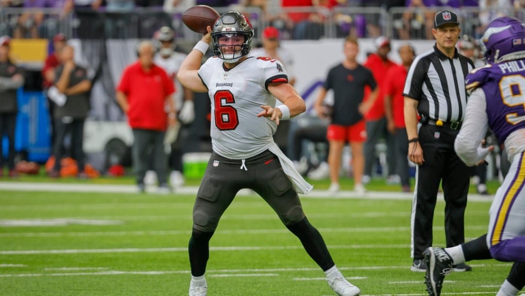 Tampa Bay Buccaneers quarterback Baker Mayfield passes against the Minnesota Vikings during the second half of an NFL football game, Sunday, Sept. 10, 2023, in Minneapolis.