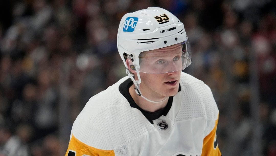 Pittsburgh Penguins left wing Jake Guentzel (59) in the second period of an NHL hockey game Wednesday, March 22, 2023, in Denver. Guentzel underwent right ankle surgery on Wednesday, Aug. 2, 2023, and will miss at least three months.