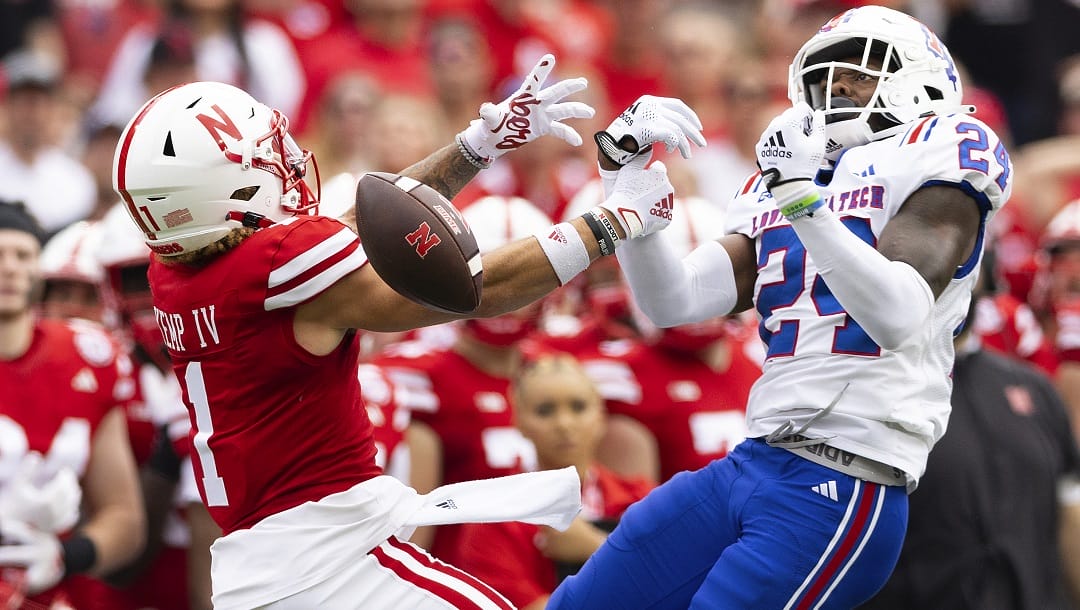 Louisiana Tech's Keyshawn Paul (24) breaks up a pass intended for Nebraska's Billy Kemp IV (1) during the first half of an NCAA college football game, Saturday, Sept. 23, 2023, in Lincoln, Neb.