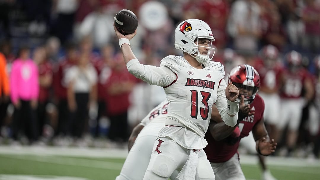 Louisville quarterback Jack Plummer throws during the second half of an NCAA college football game against the Indiana, Saturday, Sept. 16, 2023, in Indianapolis.