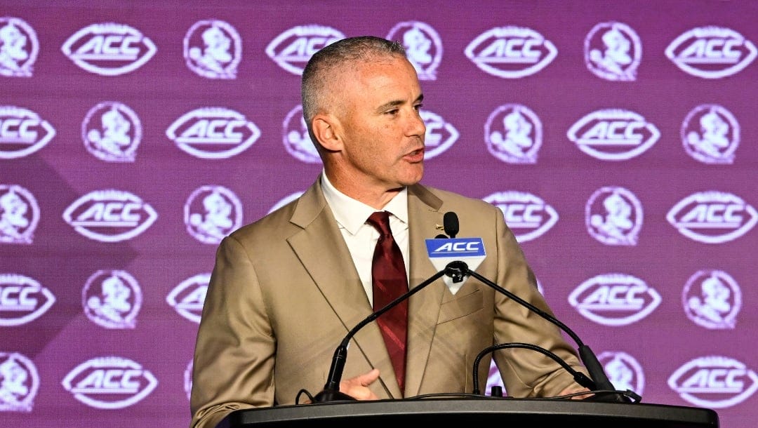 Florida State head coach Mike Norvell speaks during the Atlantic Coast Conference NCAA college football media days, Monday, July 22, 2024, in Charlotte, N.C. (AP Photo/Matt Kelley)