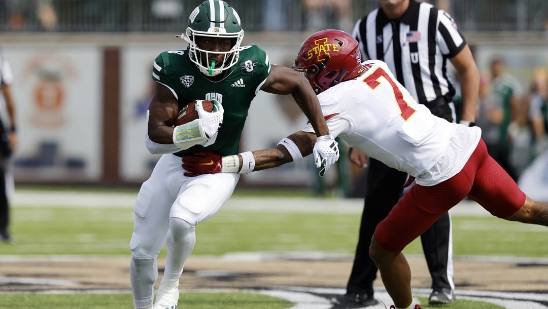 Ohio wide receiver Jacoby Jones, left, tries to get past Iowa State defensive back Malik Verdon during an NCAA college football game Saturday, Sept. 15, 2023 in Athens, Ohio.