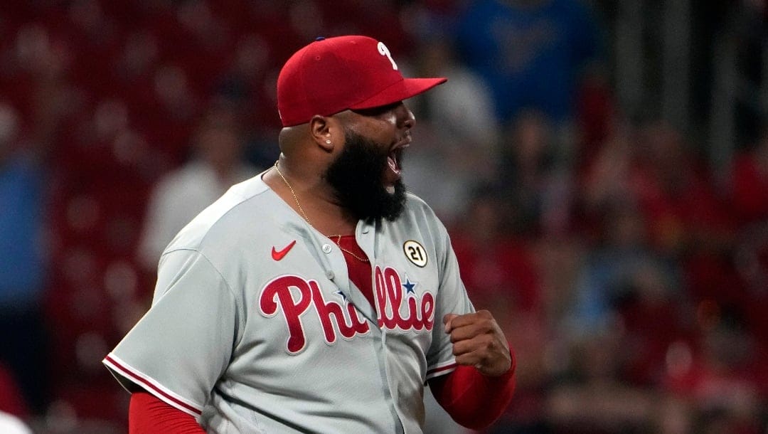 Philadelphia Phillies relief pitcher Jose Alvarado celebrates after striking out St. Louis Cardinals' Lars Nootbaar to end a baseball game Friday, Sept. 15, 2023, in St. Louis. (AP Photo/Jeff Roberson)