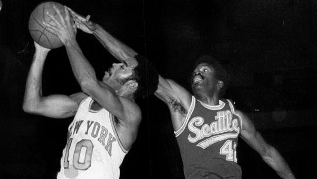 Professional basketball players Walt Frazier (left) and Lucius Allen (right).