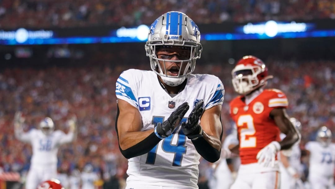 Detroit Lions wide receiver Amon-Ra St. Brown celebrates after scoring during the first half of an NFL football game against the Kansas City Chiefs Thursday, Sept. 7, 2023, in Kansas City, Mo. (AP Photo/Ed Zurga)