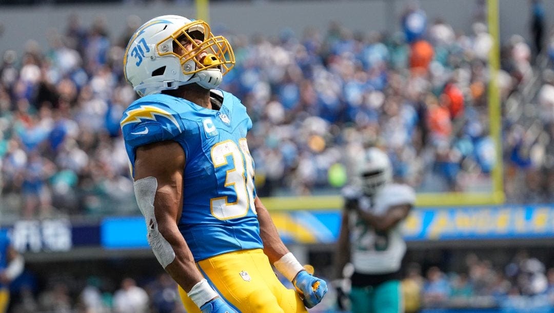 Los Angeles Chargers running back Austin Ekeler celebrates after a 55-yard run during the first half of an NFL football game against the Miami Dolphins Sunday, Sept. 10, 2023, in Inglewood, Calif.