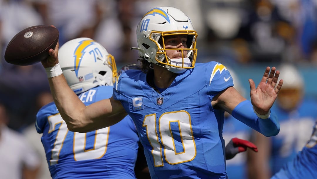 Los Angeles Chargers quarterback Justin Herbert (10) throws a pass against the Tennessee Titans during the second half of an NFL football game Sunday, Sept. 17, 2023, in Nashville, Tenn.