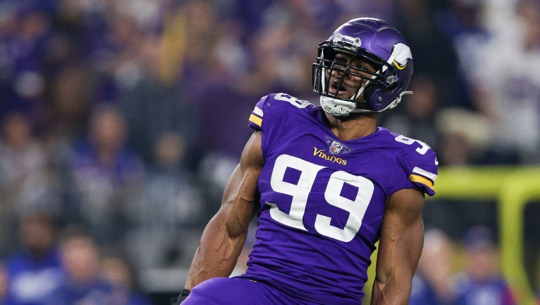 Minnesota Vikings linebacker Danielle Hunter (99) reacts after a play during the second half of an NFL wild-card football game against the New York Giants, Sunday, Jan. 15, 2023 in Minneapolis. (AP Photo/Stacy Bengs)