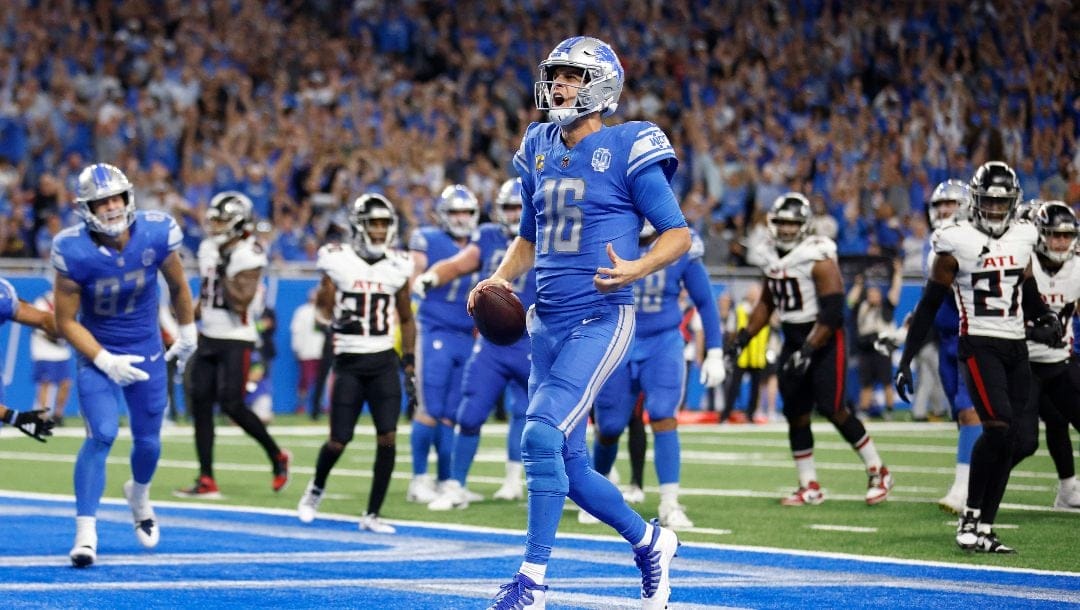 Detroit Lions quarterback Jared Goff scores a touchdown against the Atlanta Falcons during an NFL football game, Sunday, Sept. 24, 2023, in Detroit.