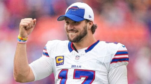 Buffalo Bills quarterback Josh Allen (17) celebrates after a touchdown during the second half of an NFL football game against the Washington Commanders, Sunday, Sept. 24, 2023, in Landover, Md. (AP Photo/Andrew Harnik)