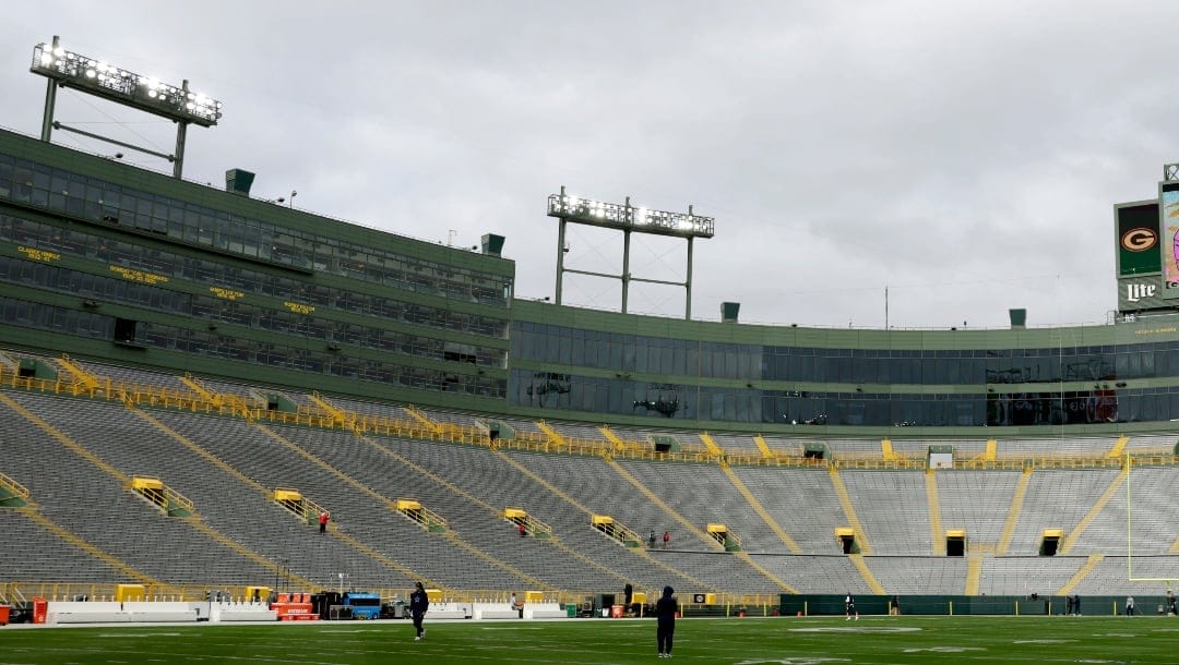 Lambeau Field sits empty before the first half of an NFL football game between the Green Bay Packers and Dallas Cowboys, Sunday, Nov. 13, 2022, in Green Bay, Wis. (AP Photo/Matt Ludtke)