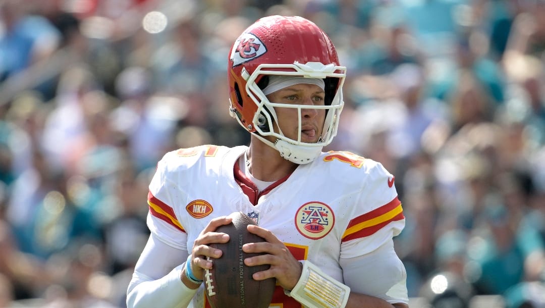 Kansas City Chiefs quarterback Patrick Mahomes (15) looks for a receiver during the second half of an NFL football game against the Jacksonville Jaguars, Sunday, Sept. 17, 2023, in Jacksonville, Fla. (AP Photo/Phelan M. Ebenhack)