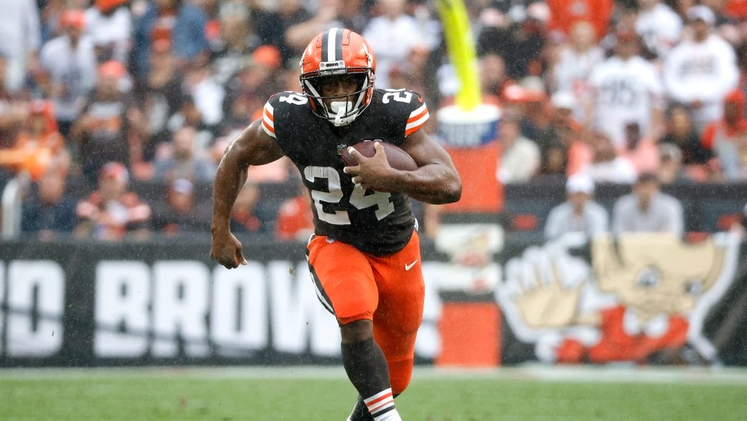 Cleveland Browns running back Nick Chubb (24) runs with the ball during an NFL football game against the Cincinnati Bengals, Sunday, Sep. 10, 2023, in Cleveland.