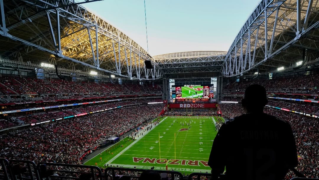 The roof at State Farm Stadium is open during the Arizona Cardinals New Orleans Saints game during the half of an NFL football game Thursday, Oct. 20, 2022, in Glendale, Ariz. (AP Photo/Darryl Webb)