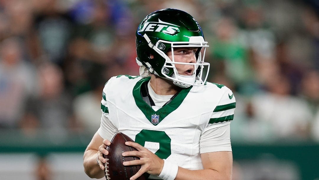 New York Jets quarterback Zach Wilson (2) looks to pass against the Buffalo Bills during the second quarter of an NFL football game, Monday, Sept. 11, 2023, in East Rutherford, N.J. (AP Photo/Adam Hunger)