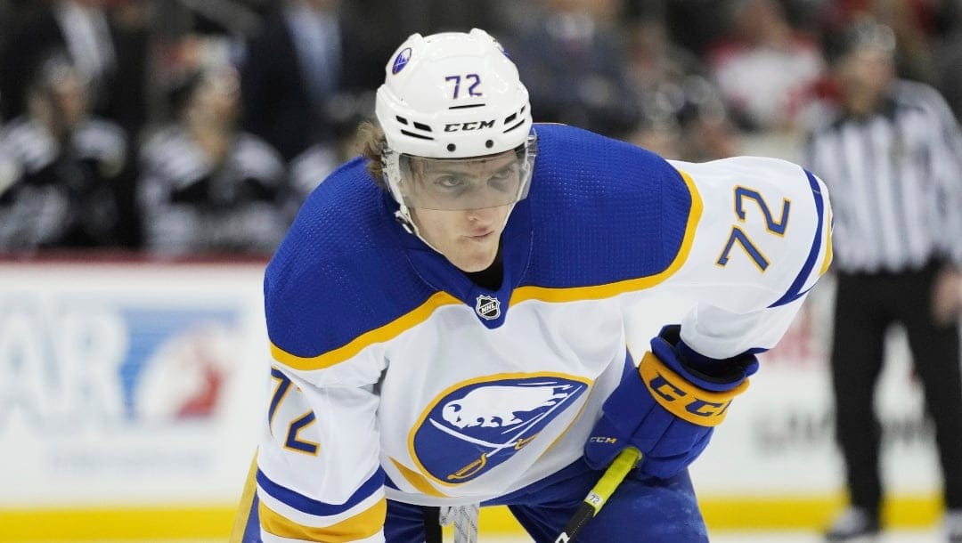 Buffalo Sabres center Tage Thompson (72) waits for a face-off during the third period of an NHL hockey game against the New Jersey Devils, Tuesday, April 11, 2023, in Newark, N.J. (AP Photo/John Minchillo)