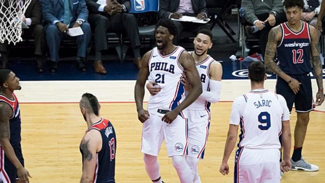 Joel Embiid of the Philadelphia 76ers flexes against the Washington Wizards during their game in February 2018.