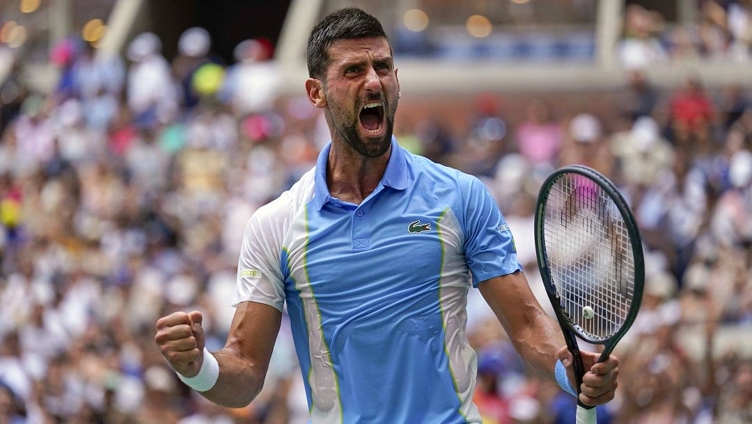 Novak Djokovic, of Serbia, reacts after defeating Taylor Fritz, of the United States, in the quarterfinals of the U.S. Open tennis championships, Tuesday, Sept. 5, 2023, in New York.