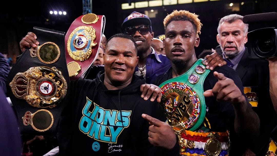 Jermell Charlo, right, celebrates after defeating Brian Castano in a super welterweight boxing title bout Saturday, May 14, 2022.