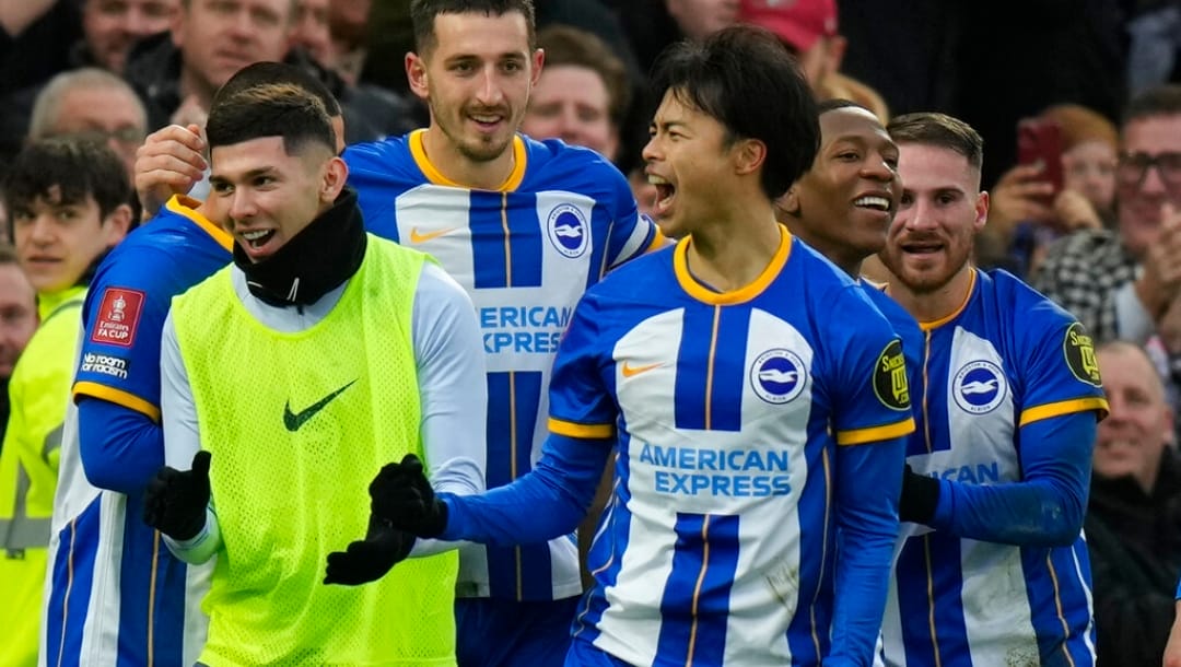 Brighton's Kaoru Mitoma celebrates after the FA Cup 4th round soccer match between Brighton and Hove Albion and Liverpool at the Falmer Stadium in Brighton, England, Sunday, Jan. 29, 2023.