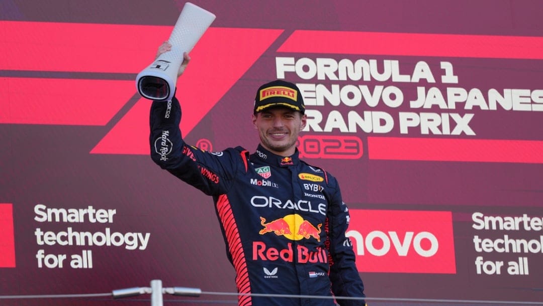 Red Bull driver Max Verstappen of the Netherlands celebrates on the podium after winning the Japanese Formula One Grand Prix at the Suzuka Circuit, Suzuka, central Japan, Sunday, Sept. 24, 2023.