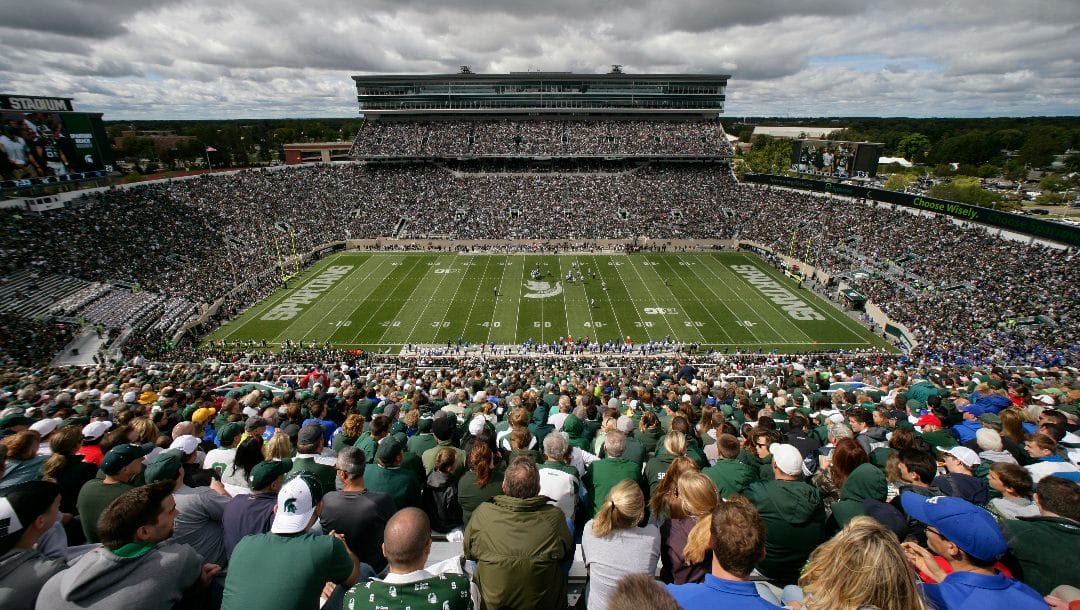 Michigan State and Air Force play an NCAA college football game, Saturday, Sept. 19, 2015, in Spartan Stadium in East Lansing, Mich. Michigan State University plans to sell alcohol at select home football games in the 2023 season following a recent change to state law that permits liquor licenses to be issued to sporting venues at public universities.