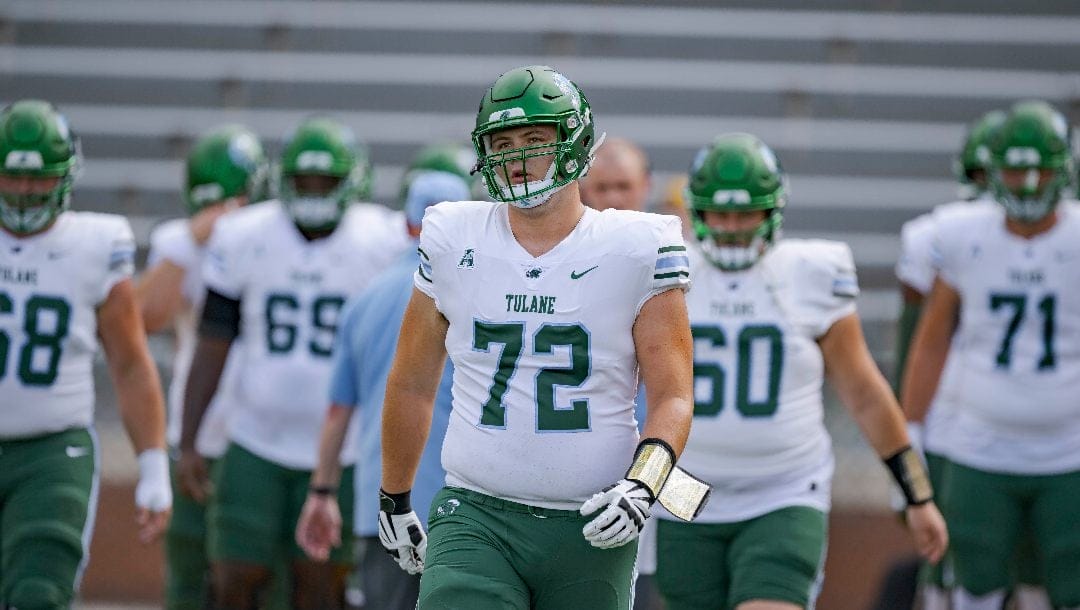 Tulane offensive lineman Trey Tuggle (72) warms up during an NCAA football game on Saturday, Sept. 16, 2023, in Hattiesburg, Miss.