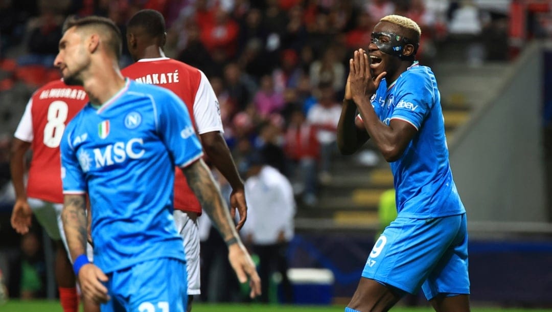 Napoli's Victor Osimhen, right, reacts after a missed scoring opportunity during the Champions League group C soccer match between SC Braga and SCC Napoli at the Municipal stadium in Braga, Portugal, Wednesday, Sept. 20, 2023.