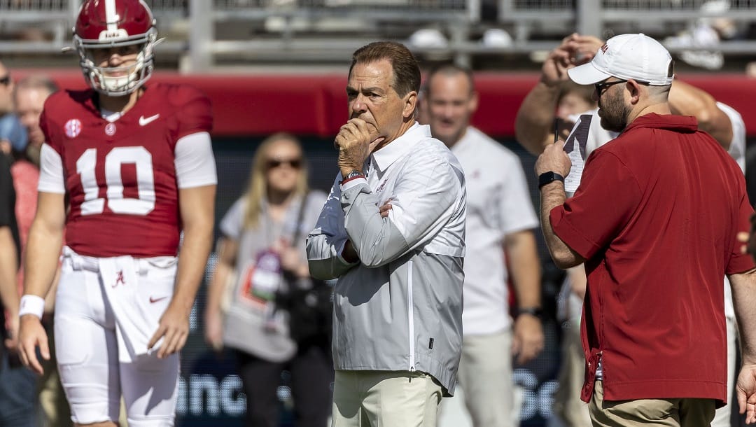 Alabama head coach Nick Saban watches his team warm up before an NCAA college football game against Arkansas, Saturday, Oct. 14, 2023, in Tuscaloosa, Ala.