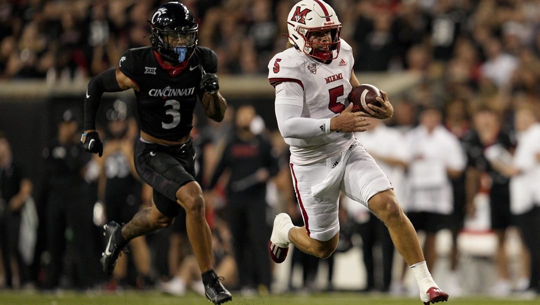 Miami (Ohio) quarterback Brett Gabbert (5) runs during an NCAA college football game against Cincinnati, Saturday, Sept. 16, 2023, in Cincinnati.