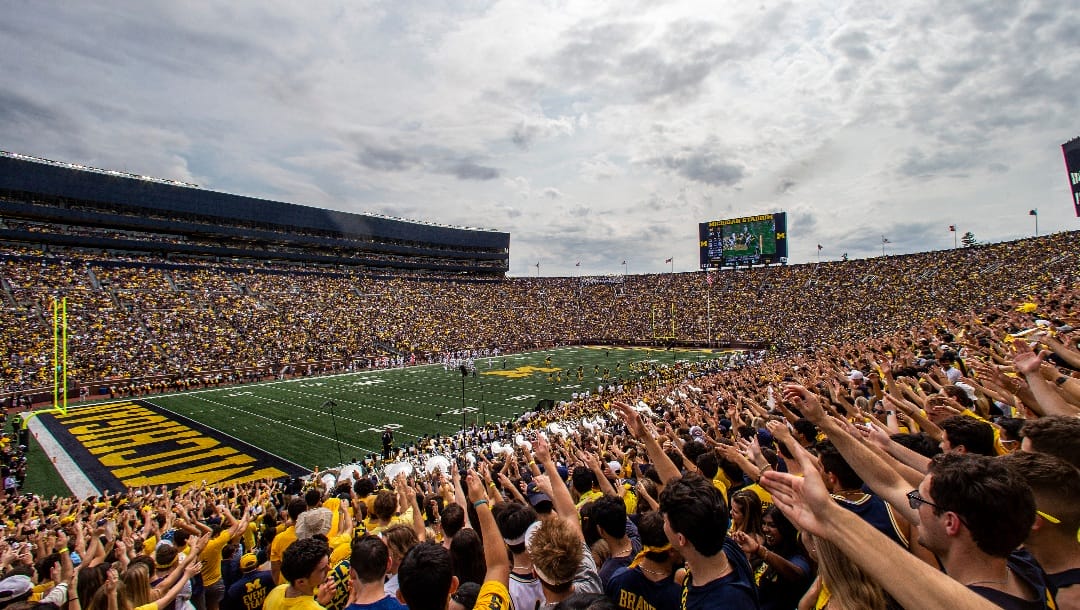 Michigan fans in the student section of Michigan Stadium in the second quarter of an NCAA college football game against Western Michigan in Ann Arbor, Mich., Saturday, Sept. 4, 2021. (AP Photo/Tony Ding)