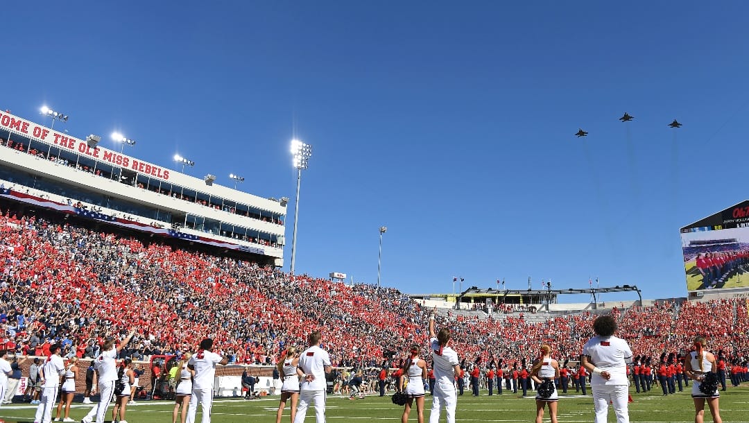 F-15 fighter jets from the 159th Fighter Wing of the Louisiana Air National Guard perform a flyover of Vaught-Hemingway Stadium before an NCAA college football game between Mississippi and Kentucky in Oxford, Miss., Saturday, Oct. 1, 2022. (AP Photo/Thomas Graning)