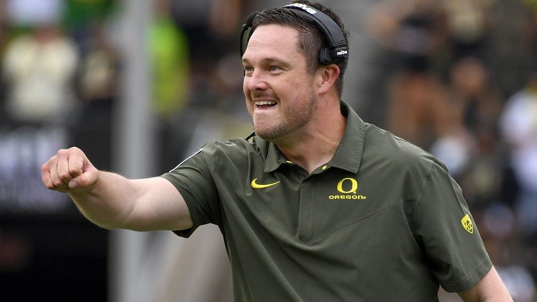Oregon coach Dan Lanning reacts to a play against BYU during the first half of an NCAA college football game Sept. 17, 2022, in Eugene, Ore. Oregon and head coach Dan Lanning have agreed to a contract extension that will extend his deal through the 2028 season. The Oregon Board of Trustees unanimously approved the terms of the contract Thursday, July 27, 2023. Lanning’s new deal will pay him a total of $45 million in base salary over six years.
