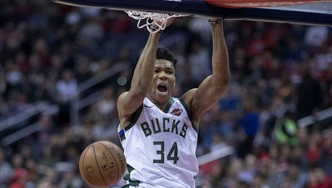 Giannis Antetokounmpo of the Milwaukee Bucks dunks the ball during the game against the Washington Wizards on January 15, 2018.