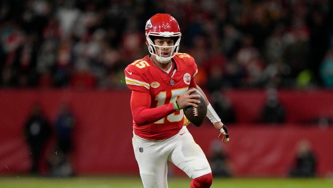 Kansas City Chiefs quarterback Patrick Mahomes (15) looks to pass the ball during an NFL football game between the Kansas City Chiefs and the Miami Dolphins at Deutsche Bank Park Stadium in Frankfurt, Germany, Sunday, Nov. 5, 2023. The Kansas City Chiefs defeated the Miami Dolphins 21-14.