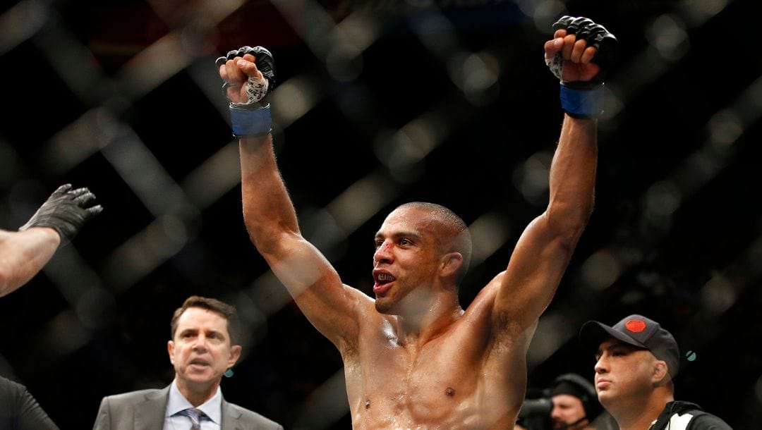 Edson Barboza celebrates after defeating Anthony Pettis during a lightweight mixed martial arts bout at UFC 197.