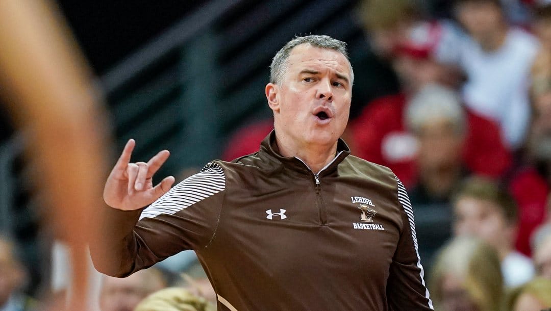 Lehigh head coach Brett Reed directs his team during the second half of an NCAA college basketball game against Wisconsin Thursday, Dec. 15, 2022, in Madison, Wis. Wisconsin won 78-56. (AP Photo/Andy Manis)