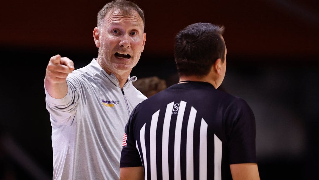 Tennessee Tech head coach John Pelphrey argues with an official during the first half of an NCAA college basketball game against Tennessee Monday, Nov. 7, 2022, in Knoxville, Tenn. (AP Photo/Wade Payne)