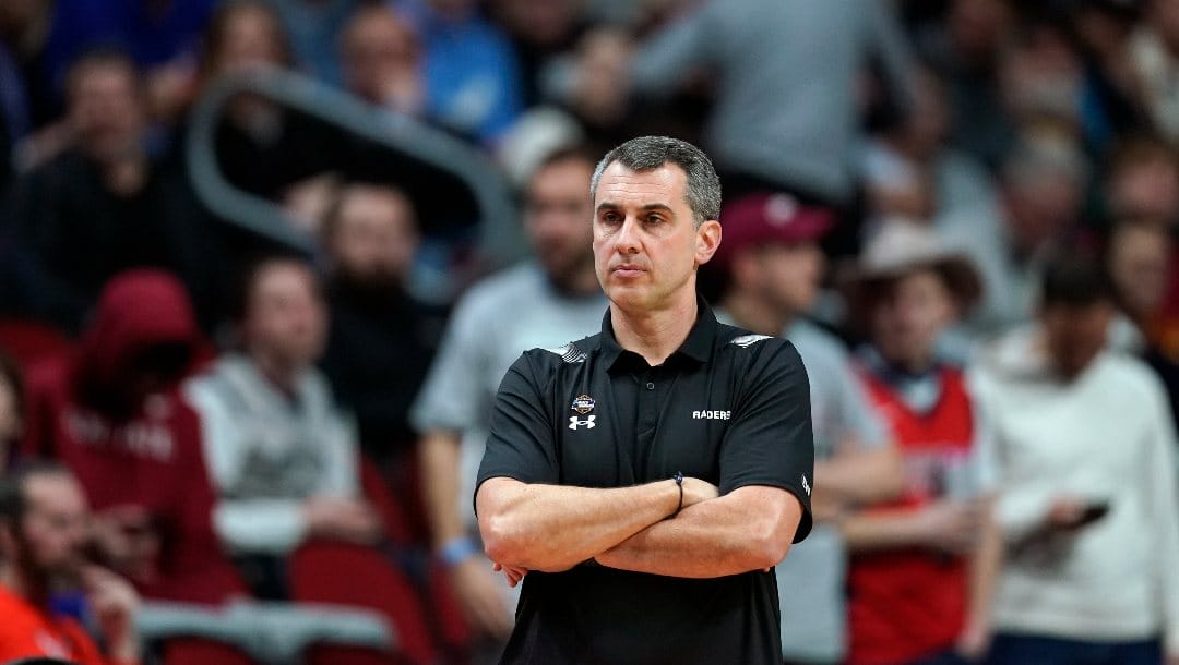 Colgate head coach Matt Langel watches from the bench in the first half of a first-round college basketball game against Texas in the NCAA Tournament, Thursday, March 16, 2023, in Des Moines, Iowa. (AP Photo/Charlie Neibergall)
