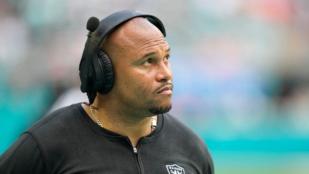 Las Vegas Raiders head coach Antonio Pierce watches the game during the second half of an NFL football game against the Miami Dolphins, Sunday, Nov. 19, 2023, in Miami Gardens, Fla.