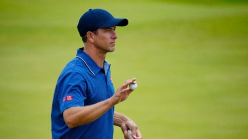 Australia's Adam Scott acknowledges the crowd on the 18th green after putting during the third day of the British Open Golf Championships at the Royal Liverpool Golf Club in Hoylake, England, Saturday, July 22, 2023.