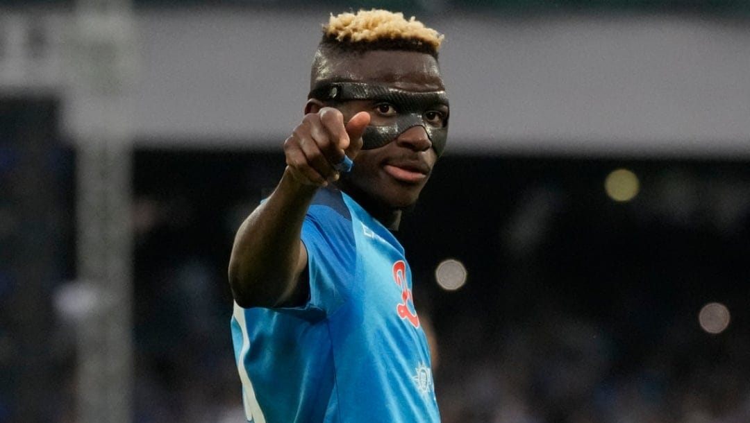 Napoli's Victor Osimhen celebrates after scoring during the Serie A soccer match between Napoli and Sampdoria at the Diego Maradona Stadium, in Naples, Sunday, June 4, 2023.
