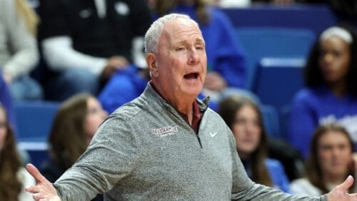 Bellarmine coach Scott Davenport reacts to a play during the first half of the team's NCAA college basketball game against Kentucky in Lexington, Ky., Tuesday, Nov. 29, 2022. (AP Photo/James Crisp)