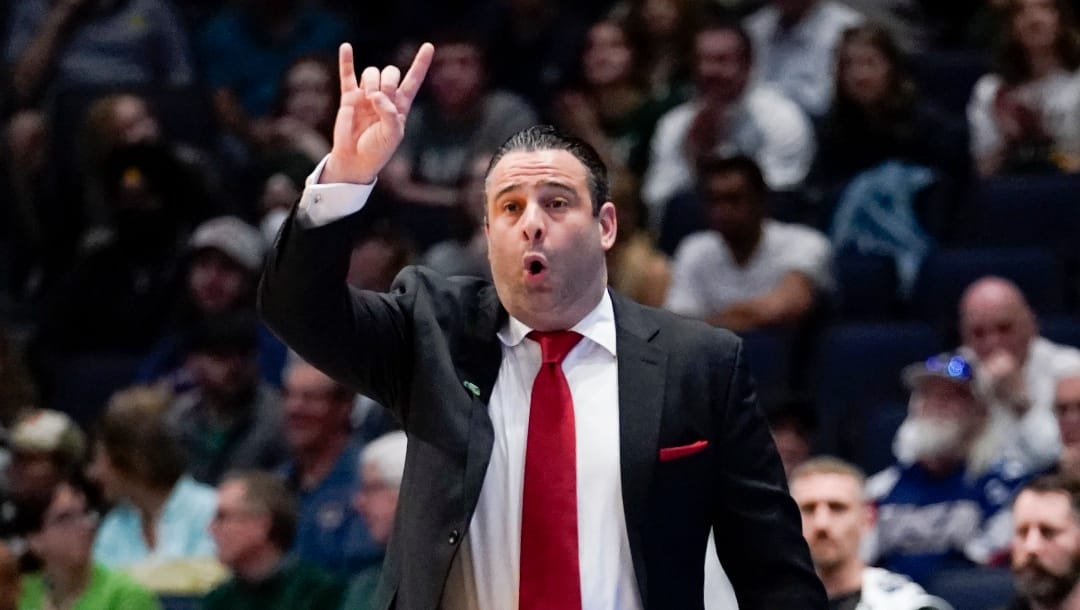 Bryant head coach Jared Grasso shouts during the first half of a First Four game against Wright State in the NCAA men's college basketball tournament, Wednesday, March 16, 2022, in Dayton, Ohio. (AP Photo/Jeff Dean)