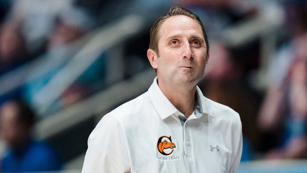 Campbell head coach Kevin McGeehan looks on in the first half of the Big South Championship NCAA college basketball game against North Carolina-Asheville on Sunday, March 5, 2023, in Charlotte, N.C.