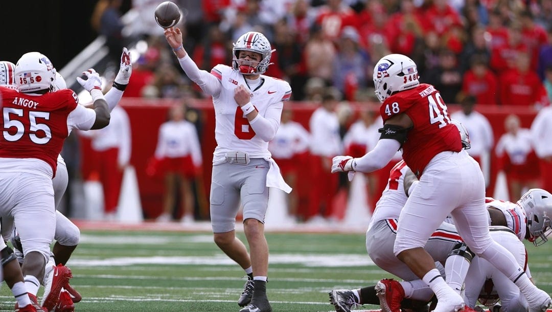 Ohio State quarterback Kyle McCord (6) throws a pass against Rutgers during the first half of a NCAA college football game, Saturday, Nov. 4, 2023, in Piscataway, N.J.