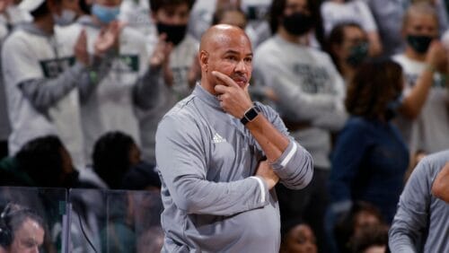 Eastern Michigan coach Stan Heath watches during the first half of an NCAA college basketball game against Michigan State, Saturday, Nov. 20, 2021, in East Lansing, Mich. Michigan State won 83-59.